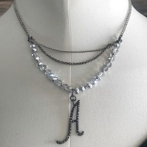 3 tier necklace with A initial. Silver, grey and black colors.